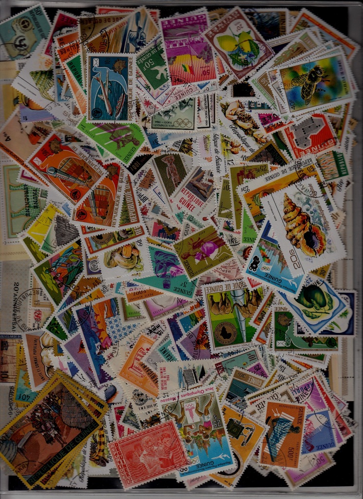 Guinea 800+ used stamps (297)